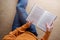 Reading Concept. Soft Focus of Young Woman Relaxing by Book in Cozy House