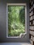 Reading corner by the window with nature view 3d render