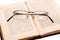 Reading - glasses on an open book