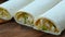 Ready burritos with chicken and veggies in corn tortillas