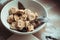 Ready dumplings in a plate on a wooden board