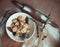 Ready dumplings in a plate on a wooden board