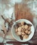 Ready dumplings in a plate on a wooden board