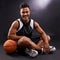 Ready for a game. Studio shot of a basketball player against a black background.