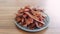 Ready-made homemade chicken slices in a dehydrator. Jerky. Close-up