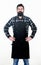 Ready to cook. Bearded hipster wear apron for barbecue. Roasting and grilling food. Picnic and barbecue. Man cook brutal