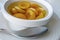 Ready to eat apricot compote in a white bowl