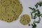 Ready to fry pressed poori made with whole wheat flour, mixed with cooked lentils, moringa leaves and spices