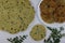 Ready to fry pressed poori made with whole wheat flour, mixed with cooked lentils, moringa leaves and spices