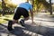 Ready to go! Close up cropped low angle photo of shoe of athlete man in running start pose