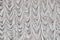 Real background of the veil on stage in the concert hall. Texture of the curtains in a music hall. Curtain of silver fabric