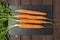 Real carrots on slate plate