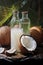 Real coconut, coconut leave and coconut oil in bottle