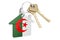 Real estate in Algeria. Home keychain with Algerian flag. Property, rent or mortgage concept. 3D rendering