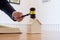 A real estate auctioneer holds a gavel in his hand 