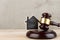 Real estate concept -auction gavel and little house with copy space