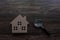 real estate and inspector concept, house model and magnifying glass on wood table