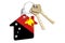 Real estate in Papua New Guinea. Home keychain with Papuan New Guinean flag. Property, rent or mortgage concept. 3D rendering