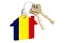 Real estate in Romania. Home keychain with Romanian flag. Property, rent or mortgage concept. 3D rendering