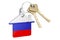Real estate in Russia. Home keychain with Russian flag. Property, rent or mortgage concept. 3D rendering