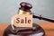 Real estate sale auction concept - gavel and key on the wooden table