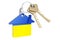 Real estate in Ukraine. Home keychain with Ukrainian flag. Property, rent or mortgage concept. 3D rendering