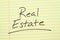 Real Estate On A Yellow Legal Pad