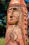 Real pagan altar in the forest with idols in summer light.