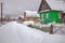 Real Russian winter, when it is freezing and a lot of snow, in the country village, with small houses