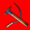 Real sickle and hammer lying as the soviet communist symbol isolated on red background