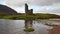 Real time clip of water rippling in front of Ardvreck Castle