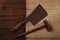 Real vintage wooden mallet and iron meat cleaver