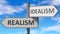 Realism and idealism as a choice - pictured as words Realism, idealism on road signs to show that when a person makes decision he