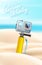 Realistic action camera on beach sand background