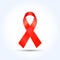 Realistic Aids Awareness red ribbon isolated on white background