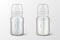 Realistic baby mother breast milk and water in two in baby milk bottles - icon set closeup on white background