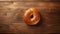 Realistic Bagel Rendering On Wooden Table - Top View