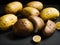 realistic baked potatoes black background long shot