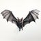 Realistic Bat Portrait On White Wall: Detailed Miniature Art