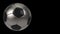 Realistic black and iron soccer ball isolated on black background.