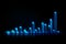 Realistic blue neon business graph shines on dark background