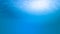Realistic Blue under water ocean with sunlight reflection and wave surface