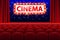 Realistic cinema hall interior with red seats. Retro style cinema sign with spot light frame. Movie premiere poster