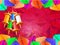 Realistic colorful kites decorated red blurry background.
