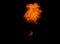 Realistic fiery explosion over a black background