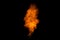 Realistic fiery explosion over a black background