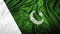 Realistic flag of Pakistan on the wavy surface of fabric