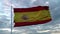 Realistic flag of Spain waving in the wind against deep Dramatic Sky. 4K UHD 60 FPS Slow-Motion