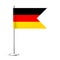 Realistic German table flag on a chrome steel pole. Souvenir from Germany. Desk flag made of paper or fabric and shiny