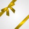 Realistic golden bow with gold, yellow ribbons isolated on white. Element for decoration gifts, greetings, holidays. Vector